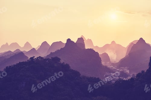 Preview: Sunset over Karst mountains formations in Guilin, China.