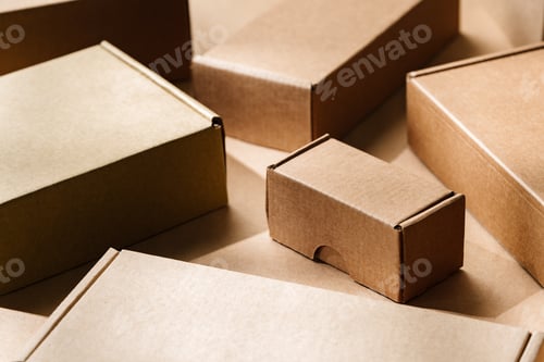 Preview: Multiple cardboard boxes arranged on a surface for packaging and shipping in a warehouse setting