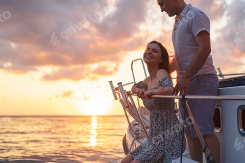 Preview: Loving couple spending time on a yacht at the sea