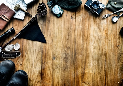 Preview: Aerial view of camping stuff on wooden background