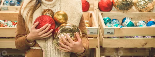 Preview: Girl in a warm coat holding large ball