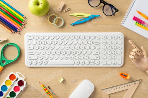 Preview: Embrace the convenience of online learning with this top-down photo featuring a keyboard