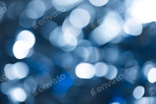 Preview: Blue bokeh lights with copy space on dark background