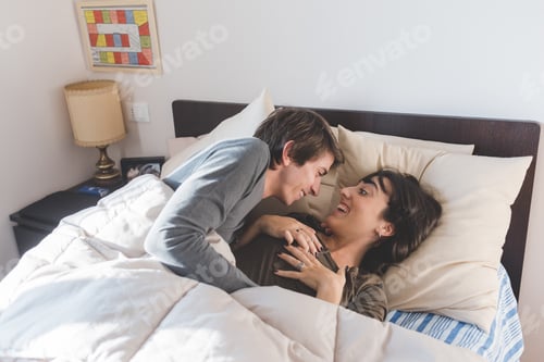 Preview: Couple lovers hugging bed having fun