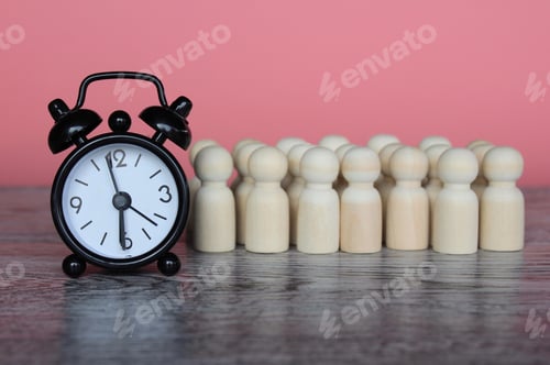 Preview: Alarm clock and wooden dolls.