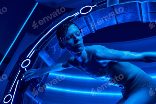 Preview: discovery breakthrough, humanoid alien in goggles appearing in experimental device in science center