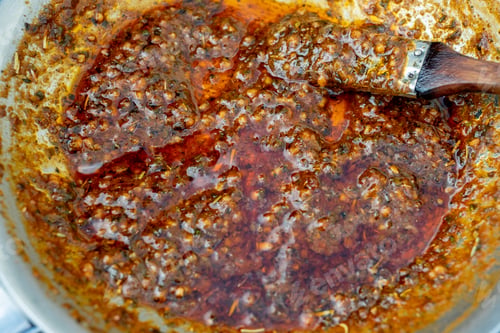 Preview: Closeup of a bowl of homemade barbeque sauce.