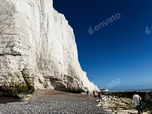 Preview: Visitors walk along the white chalk cliffs at Seven Sisters in East Sussex UK