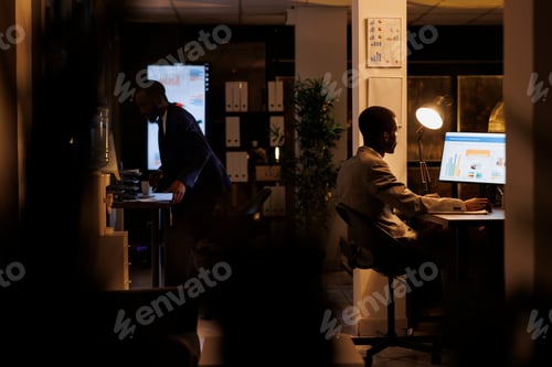 Preview: Executive manager working late at night in startup office