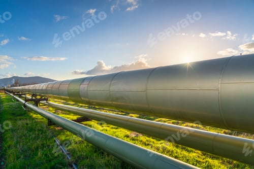 Preview: Geothermal energy. Pipelines of a plant at sunset in Larderello, Tuscany region, Italy