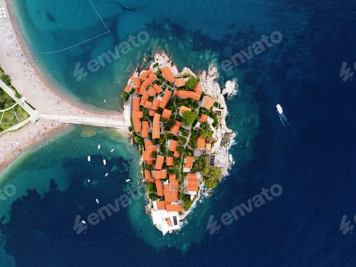 Preview: Aerophotography. Aerial view of Sveti Stefan island in a beautiful summer day, Montenegro from