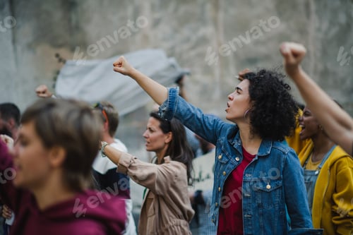 Preview: Group of people activists protesting on streets, strike and demonstration concept.