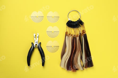 Preview: Composition with hair extension accessories on yellow background