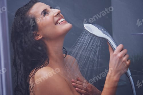 Preview: Adult woman under the shower in bathroom