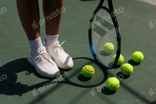 Preview: young woman playing tennis on the tennis court, olympic sport
