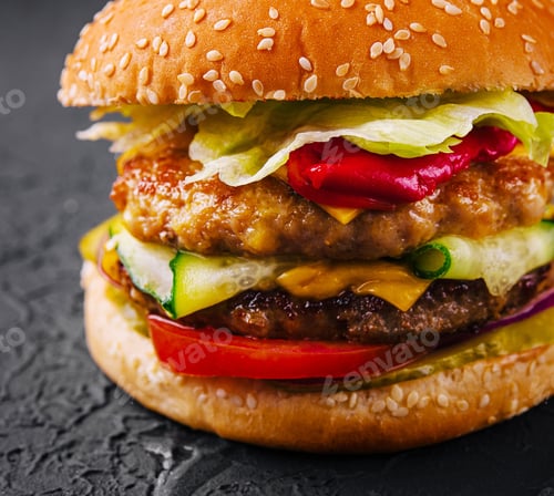 Preview: burger with two cutlets and fresh vegetables