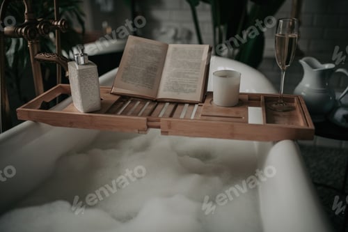 Preview: Luxury interior of eco style modern bathroom with oval bathtub and book on bamboo wood tray