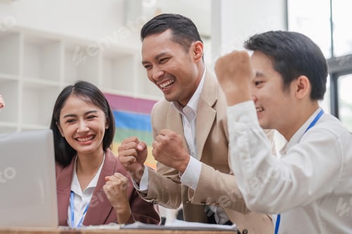 Preview: Asain business team Happy to be successful partnership teamwork achieved the desired goal