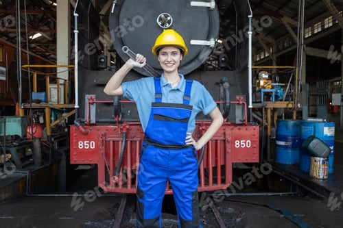 Preview: Portrait of Engineer train Inspect the train's diesel engine, railway track in depot of train