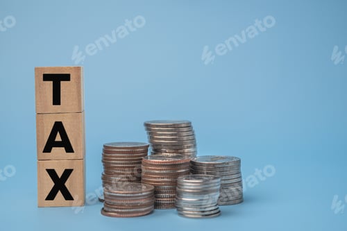 Preview: Wooden Cube Tax Payment Concept with Coins. Business financial planning growth and success wealth