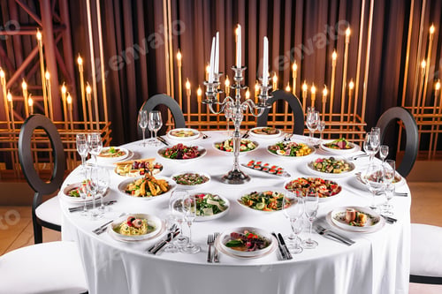 Preview: Elegant dinner table setup with candlelight