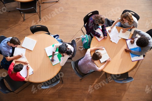 Preview: Overhead Shot Of High School Pupils In Group Study Around Tables