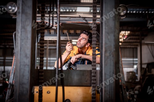 Preview: Worker industry factory wear safety uniform factory drive forklift truck moving goods to industry pr