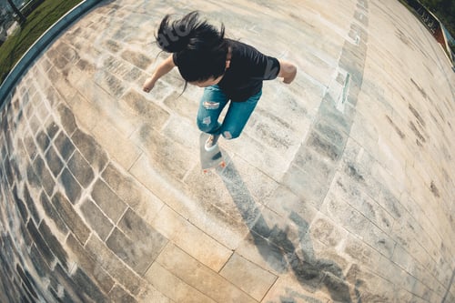 Preview: Skateboarder skateboarding outdoors in the morning