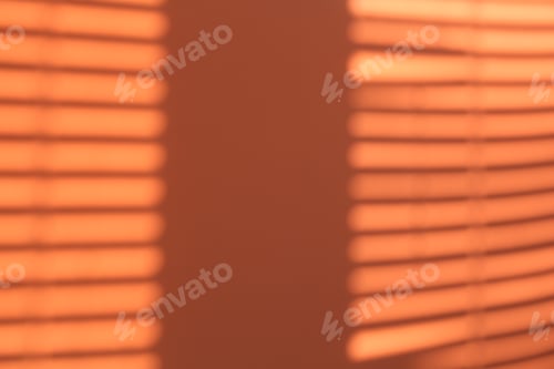 Preview: Light and shadows falling on orange background