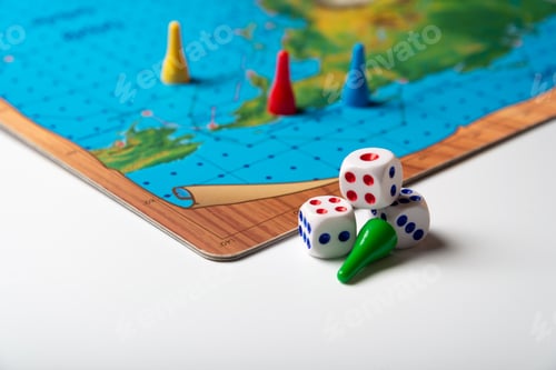 Preview: Dice with numbers and playing chips near the board game