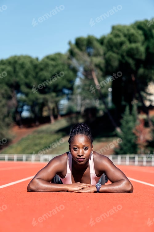 Preview: Athlete sprinter looking at camera