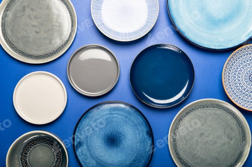 Preview: Empty Blue Plates on Grey Background
