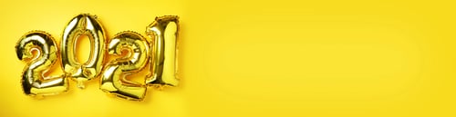 Preview: Golden foil balloons made numbers 2021 on yellow background with light bokehs. Banner, copy space