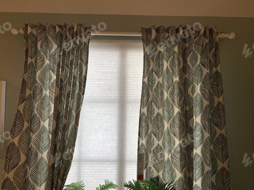 Preview: Low angle shot of the curtains in a room