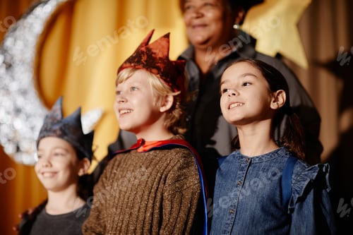 Preview: Children Performing on Stage During School Play