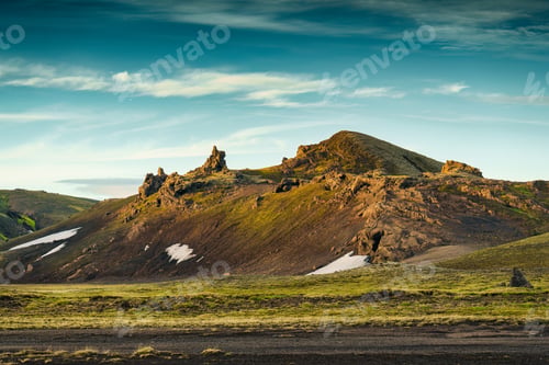 Preview: Volcanic mountain on mossy wilderness in summer at highland