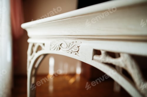 Preview: White wooden carved table in flat.