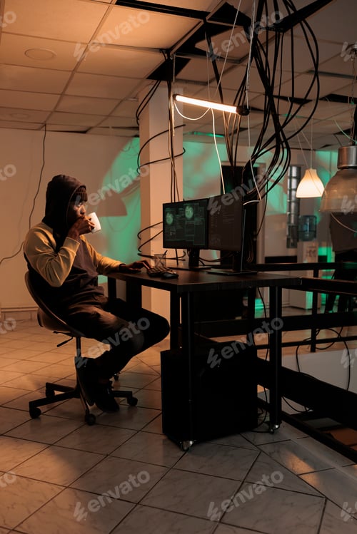 Preview: Young man working on security breach hacking