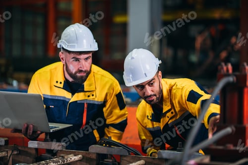 Preview: Engineers or foreman inspecting and check up machine at factory machines.
