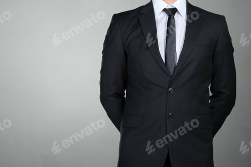 Preview: A businessman with his arms crossed