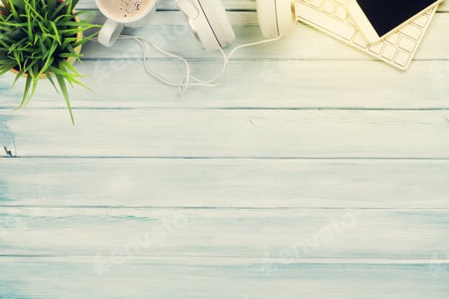Preview: Headphones, phone and pc on wooden desk table