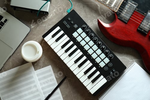 Preview: Musician workplace on gray textured table, top view