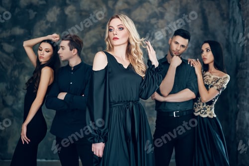 Preview: Group of young beautiful people posing in studio