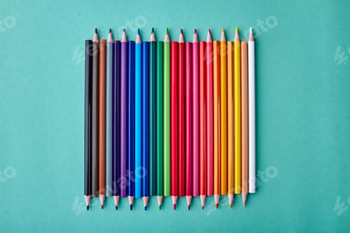 Preview: Row of multicolored pencils on color background.