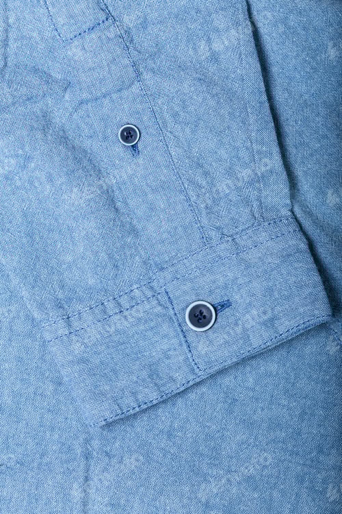 Preview: Close Up of a Light Blue Button-Down Shirt