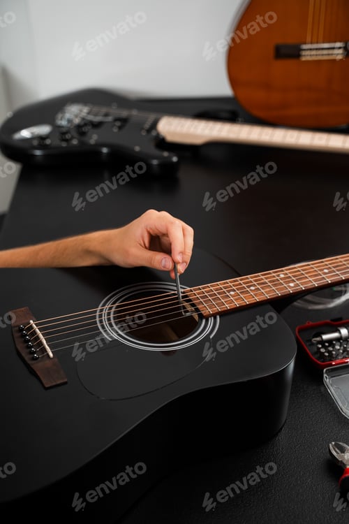 Preview: Neck relief adjustment on acoustic guitar with Allen key tool