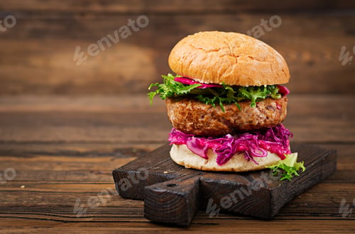 Preview: Sandwich hamburger with juicy burgers, red cabbage and pink sauce
