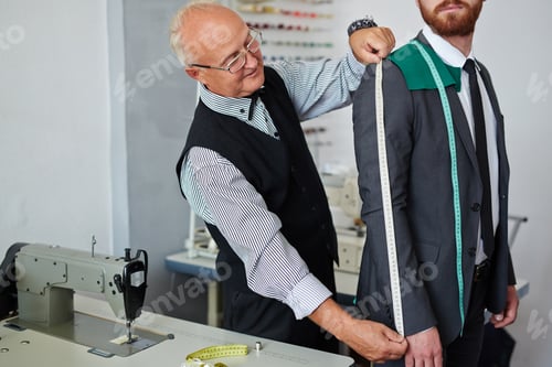 Preview: Tailor Measuring a Client for a Custom Suit