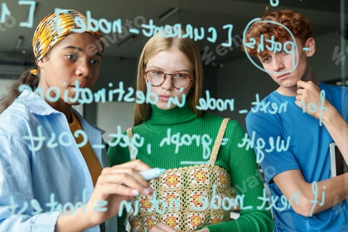 Preview: Students Writing on Glass Wall in Team