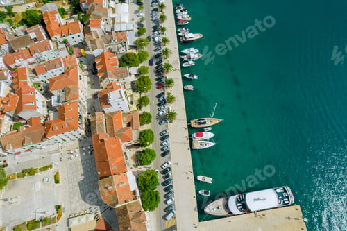 Preview: Berths for yachts near the resort town. Embankment near the sea, Roadway for cars.